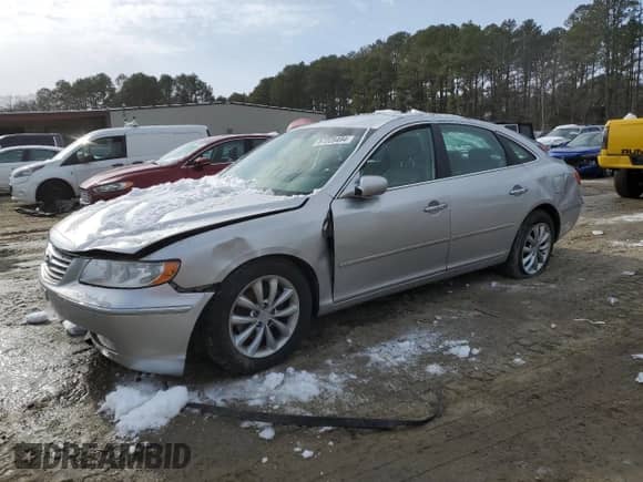 2007 Hyundai Azera SE z VIN KMHFC46F47A188591, wystawiony jako Copart lot #87225494 z przebiegiem 86 047 mil mil oraz Szkoda całkowita • Salvage title. Historia ofert i sprzedaży dostępna na DreamBid. Obrazek 1.