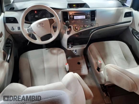2012 Toyota Sienna with VIN 5TDZK3DC3CS240569, listed as a Copart auction lot 63664415 with 129,329 mi miles and Salvage title. Bid and sale history available at DreamBid. Image 8.