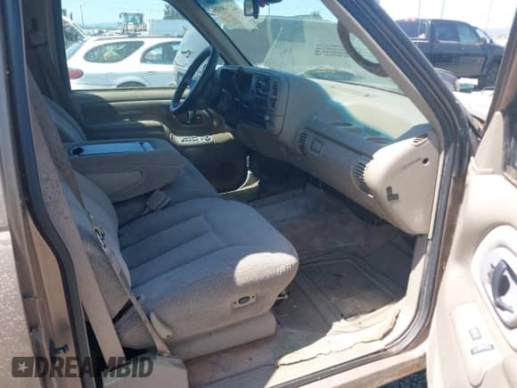 1996 Chevrolet Tahoe with VIN 1GNEK13R9TJ313571, listed as a IAAI auction lot 42768008 with 220,143 mi miles and . Bid and sale history available at DreamBid. Image 5.
