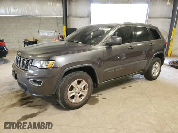 2017 Jeep Grand Cherokee Laredo with VIN 1C4RJEAG0HC746651, listed as a Copart auction lot 70644395 with 143,813 mi miles and Salvage title. Bid and sale history available at DreamBid. Image 1.