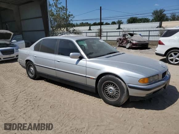 1999 BMW 7 Series 740iL z VIN WBAGH8332XDP00274, wystawiony jako Copart lot #74191654 z przebiegiem 134 901 mil mil oraz Szkoda całkowita • Salvage title. Historia ofert i sprzedaży dostępna na DreamBid. Obrazek 4.