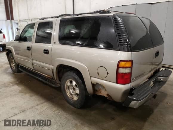 2000 Chevrolet Suburban with VIN 1GNFK16T9YJ169393, listed as a Copart auction lot 84970004 with 304,002 mi miles and Salvage title. Bid and sale history available at DreamBid. Image 2.