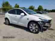 2023 Tesla Model Y Long Range с VIN 7SAYGDEE4PF596884, выставлен на аукционе Copart как лот 69856524 с пробегом 22 765 миль миль и Списание • Salvage title. История ставок и продаж доступна на DreamBid. Изображение 4.