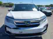 2022 Honda Pilot Touring 7-Passenger z VIN 5FNYF5H66NB034248, wystawiony jako IAAI lot #41777362 z przebiegiem 26 611 mil mil oraz . Historia ofert i sprzedaży dostępna na DreamBid. Obrazek 12.