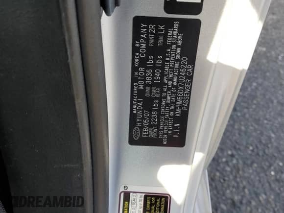 2007 Hyundai Tiburon GS with VIN KMHHM66DX7U246220, listed as a Copart auction lot 53555715 with 105,305 mi miles and Salvage title. Bid and sale history available at DreamBid. Image 12.