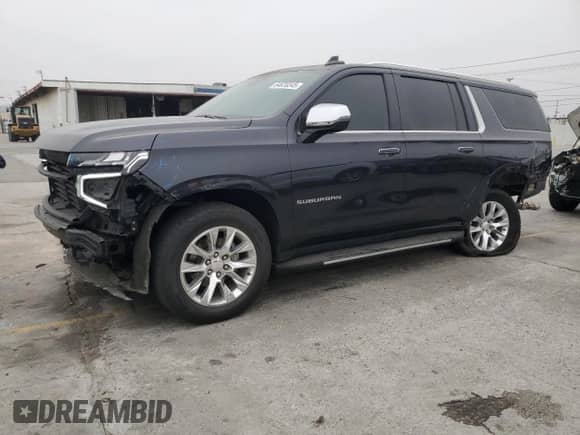 2023 Chevrolet Suburban Premier z VIN 1GNSCFKD0PR266618, wystawiony jako Copart lot #64620245 z przebiegiem 61 991 mil mil oraz Szkoda całkowita • Salvage title. Historia ofert i sprzedaży dostępna na DreamBid. Obrazek 1.