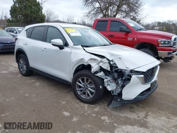 2023 Mazda CX-5 S Carbon Edition z VIN JM3KFBCM8P0187510, wystawiony jako IAAI lot #42628848 z przebiegiem 42 972 mil mil oraz . Historia ofert i sprzedaży dostępna na DreamBid. Obrazek 1.