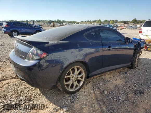2008 Hyundai Tiburon GT с VIN KMHHN66F68U279070, выставлен на аукционе Copart как лот 74675574 с пробегом 92 020 миль миль и Списание • Salvage title. История ставок и продаж доступна на DreamBid. Изображение 3.