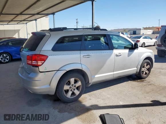 2009 Dodge Journey SXT с VIN 3D4GG57V59T241760, выставлен на аукционе Copart как лот 80456025 с пробегом 212 459 миль миль и Списание • Salvage title. История ставок и продаж доступна на DreamBid. Изображение 3.