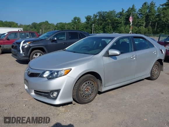 2014 Toyota Camry SE with VIN 4T1BF1FK9EU404237, listed as a IAAI auction lot 42948664 with 226,429 mi miles and . Bid and sale history available at DreamBid. Image 2.