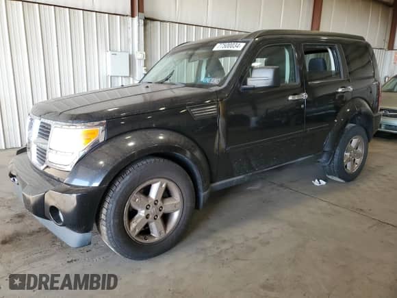 2009 Dodge Nitro SXT z VIN 1D8GU28KX9W536809, wystawiony jako Copart lot #77500034 z przebiegiem 155 737 mil mil oraz Szkoda całkowita • Salvage title. Historia ofert i sprzedaży dostępna na DreamBid. Obrazek 1.
