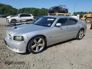 2007 Dodge Charger SRT-8 с VIN 2B3LA73W37H668188, выставлен на аукционе Copart как лот 68350674 с пробегом 150 769 миль миль и Списание • Salvage title. История ставок и продаж доступна на DreamBid. Изображение 1.
