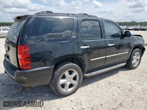 2011 Chevrolet Tahoe LTZ с VIN 1GNSCCE04BR386485, выставлен на аукционе Copart как лот 70738925 с пробегом 105 001 миль миль и Списание • Salvage title. История ставок и продаж доступна на DreamBid. Изображение 3.