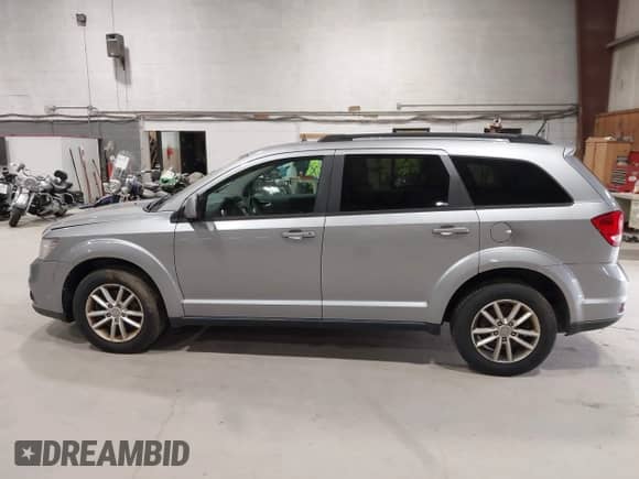 2017 Dodge Journey SXT with VIN 3C4PDDBG7HT515001, listed as a IAAI auction lot 43532217 with 124,332 mi miles and . Bid and sale history available at DreamBid. Image 14.