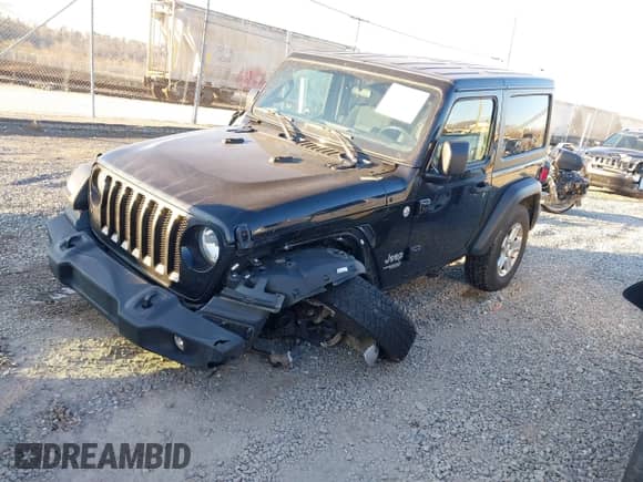2020 Jeep Wrangler Sport S with VIN 1C4GJXAGXLW228489, listed as a IAAI auction lot 41263174 with 61,400 mi miles and . Bid and sale history available at DreamBid. Image 2.
