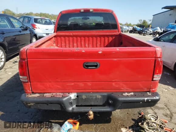 2003 Dodge Dakota Sport with VIN 1D7HL38NX3S222930, listed as a Copart auction lot 71812234 with 203,140 mi miles and Salvage title. Bid and sale history available at DreamBid. Image 6.