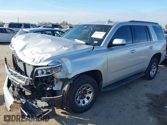 2019 Chevrolet Tahoe LS with VIN 1GNSCAKC6KR348081, listed as a IAAI auction lot 41409071 with 45,451 mi miles and . Bid and sale history available at DreamBid. Image 2.