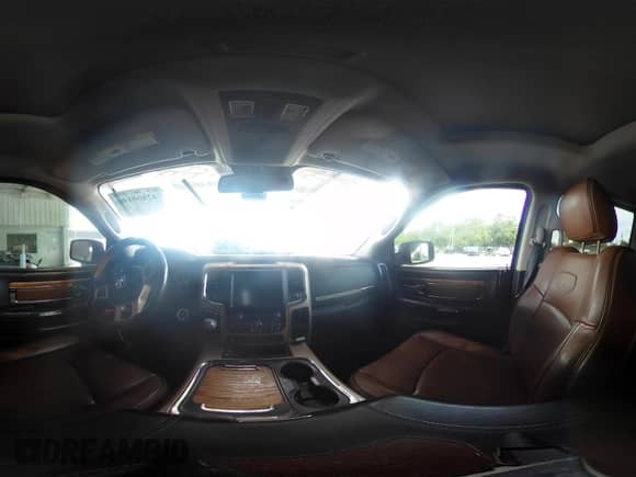 2015 Ram 1500 Laramie Limited with VIN 1C6RR7PT1FS788507, listed as a IAAI auction lot 42400146 with 129,572 mi miles and . Bid and sale history available at DreamBid. Image 19.