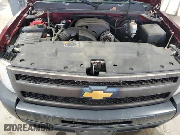 2013 Chevrolet Silverado 1500 Work Truck z VIN 1GCRKPEA4DZ397418, wystawiony jako Copart lot #82654955 z przebiegiem 103 318 mil mil oraz Czysty tytuł • Clean title. Historia ofert i sprzedaży dostępna na DreamBid. Obrazek 11.