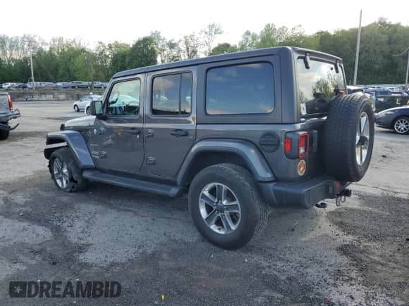 2022 Jeep Wrangler Unlimited Sahara with VIN 1C4HJXEN0NW110192, listed as a Copart auction lot 57206625 with 32,964 mi miles and Salvage title. Bid and sale history available at DreamBid. Image 2.