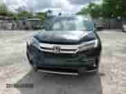 2022 Honda Pilot Touring 7-Passenger with VIN 5FNYF5H60NB034388, listed as a Copart auction lot 65687615 with 49,231 mi miles and Salvage title. Bid and sale history available at DreamBid. Image 14.