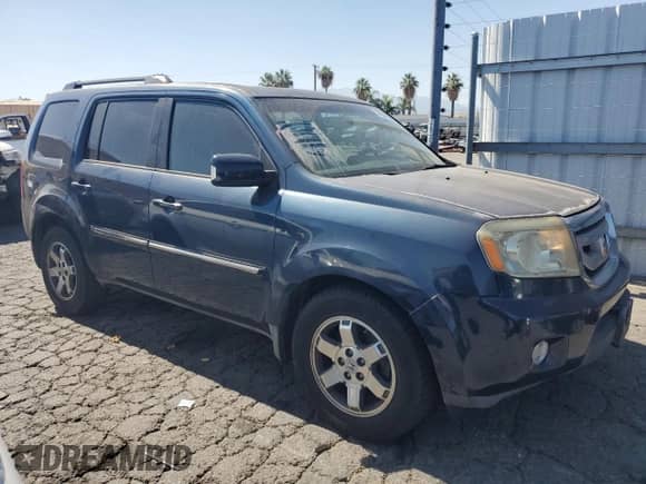 2009 Honda Pilot Touring with VIN 5FNYF488X9B041284, listed as a Copart auction lot 64602555 with 273,147 mi miles and Salvage title. Bid and sale history available at DreamBid. Image 4.
