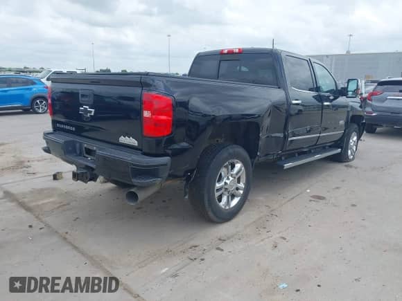 2018 Chevrolet Silverado 2500HD High Country с VIN 1GC1KXEY4JF228278, выставлен на аукционе IAAI как лот 42138827 с пробегом 64 550 миль миль и . История ставок и продаж доступна на DreamBid. Изображение 4.