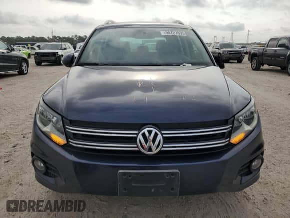 2013 Volkswagen Tiguan SE z VIN WVGAV3AX9DW056696, wystawiony jako Copart lot #54721695 z przebiegiem 108 656 mil mil oraz Szkoda całkowita • Salvage title. Historia ofert i sprzedaży dostępna na DreamBid. Obrazek 5.