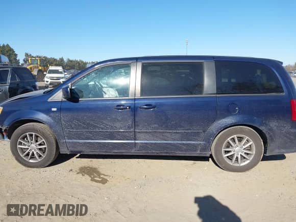 2014 Dodge Grand Caravan American Value with VIN 2C4RDGBG4ER193779, listed as a IAAI auction lot 41447552 with 89,498 mi miles and . Bid and sale history available at DreamBid. Image 15.