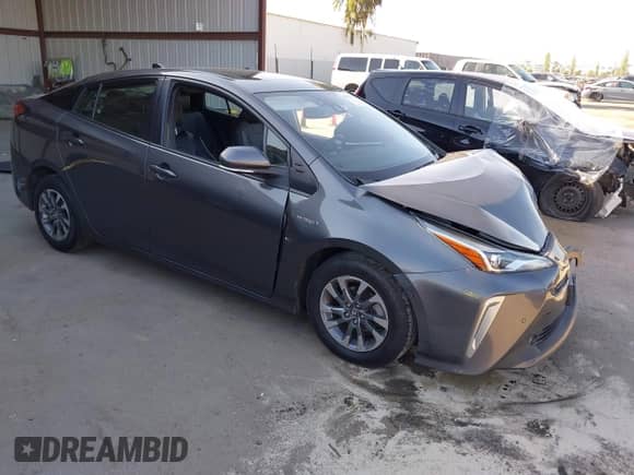 2022 Toyota Prius Nightshade with VIN JTDKAMFU4N3155017, listed as a IAAI auction lot 43013402 with 146,084 mi miles and . Bid and sale history available at DreamBid. Image 1.