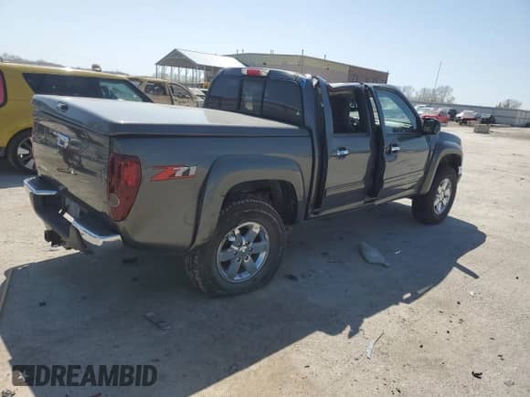 2011 Chevrolet Colorado 2LT with VIN 1GCHSDFE5B8131243, listed as a Copart auction lot 52133755 with 123,572 mi miles and Salvage title. Bid and sale history available at DreamBid. Image 3.
