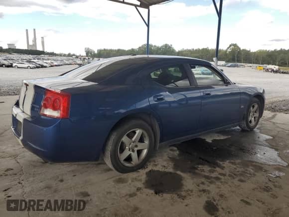2009 Dodge Charger SXT с VIN 2B3KA33V79H514212, выставлен на аукционе Copart как лот 73103164 с пробегом 211 375 миль миль и Списание • Salvage title. История ставок и продаж доступна на DreamBid. Изображение 3.