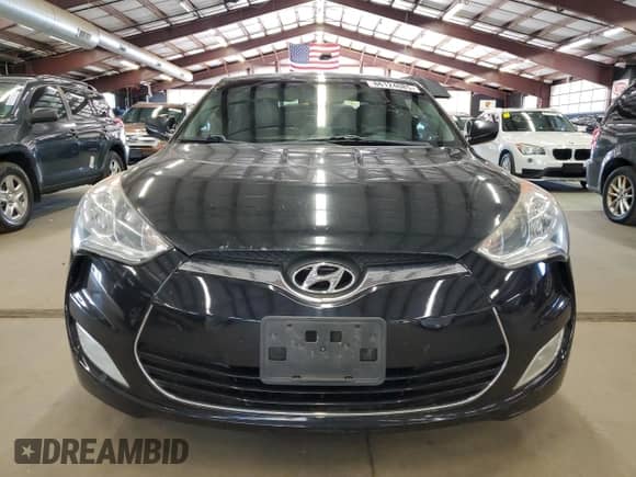2013 Hyundai Veloster w/Black Int z VIN KMHTC6AD3DU111385, wystawiony jako Copart lot #86124085 z przebiegiem 144 014 mil mil oraz Czysty tytuł • Clean title. Historia ofert i sprzedaży dostępna na DreamBid. Obrazek 5.