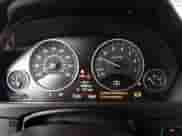 2014 BMW 3 Series 328i with VIN WBA3C1C57EK117469, listed as a IAAI auction lot 43207455 with 77,275 mi miles and . Bid and sale history available at DreamBid. Image 7.