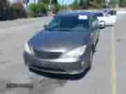 2005 Toyota Camry STD with VIN 4T1BE32K15U989898, listed as a IAAI auction lot 42880938 with 210,464 mi miles and . Bid and sale history available at DreamBid. Image 6.