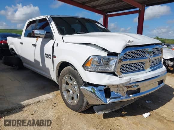 2018 Ram 1500 Laramie z VIN 1C6RR6VT1JS250301, wystawiony jako IAAI lot #42736798 z przebiegiem 93 532 mil mil oraz . Historia ofert i sprzedaży dostępna na DreamBid. Obrazek 1.