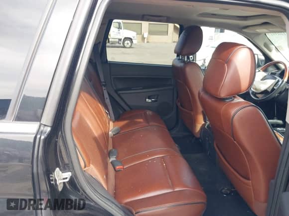 2009 Jeep Grand Cherokee with VIN 1J8HS68T49C524111, listed as a IAAI auction lot 41605917 with 133,441 mi miles and . Bid and sale history available at DreamBid. Image 8.