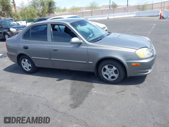 2003 Hyundai Accent GL с VIN KMHCG45C73U471607, выставлен на аукционе IAAI как лот 41956551 с пробегом 222 305 миль миль и . История ставок и продаж доступна на DreamBid. Изображение 13.