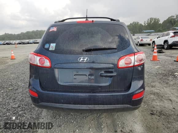 2012 Hyundai Santa Fe GLS с VIN 5XYZG3AB5CG126261, выставлен на аукционе Copart как лот 70002975 с пробегом 133 121 миль миль и Списание • Salvage title. История ставок и продаж доступна на DreamBid. Изображение 6.
