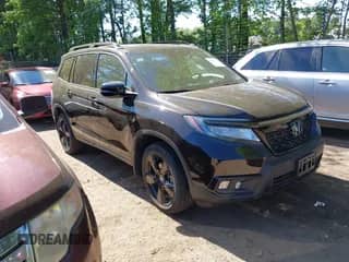 2021 Honda Passport Elite z VIN 5FNYF8H03MB026880, wystawiony jako IAAI lot #42181712 z przebiegiem 36 510 mil mil oraz . Historia ofert i sprzedaży dostępna na DreamBid. Obrazek 1.