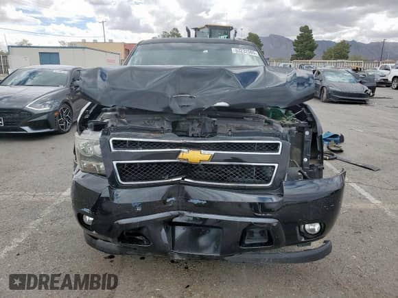 2014 Chevrolet Tahoe LT z VIN 1GNSKBE09ER153221, wystawiony jako Copart lot #63232565 z przebiegiem 176 006 mil mil oraz Szkoda całkowita • Salvage title. Historia ofert i sprzedaży dostępna na DreamBid. Obrazek 5.