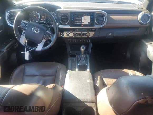 2016 Toyota Tacoma Limited с VIN 3TMGZ5AN5GM029447, выставлен на аукционе Copart как лот 81628975 с пробегом 92 634 миль миль и Списание • Salvage title. История ставок и продаж доступна на DreamBid. Изображение 8.