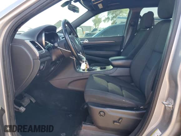 2020 Jeep Grand Cherokee Laredo E with VIN 1C4RJEAG8LC245127, listed as a Copart auction lot 63401005 with 149,043 mi miles and Salvage title. Bid and sale history available at DreamBid. Image 7.