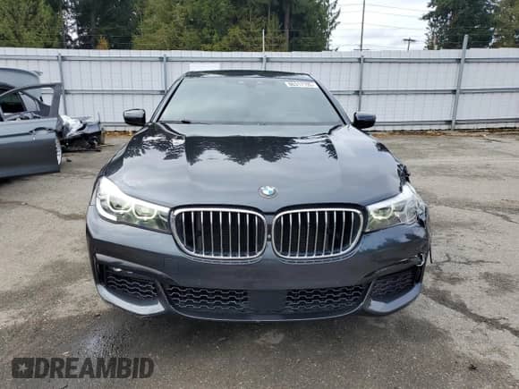 2016 BMW 7 Series 740i z VIN WBA7E2C56GG547680, wystawiony jako Copart lot #86317195 z przebiegiem 85 092 mil mil oraz Szkoda całkowita • Salvage title. Historia ofert i sprzedaży dostępna na DreamBid. Obrazek 5.
