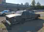 1987 Chevrolet Caprice z VIN 1G1BN51Z4HA101321, wystawiony jako Copart lot #68798424 z przebiegiem 89 528 mil mil oraz Szkoda całkowita • Salvage title. Historia ofert i sprzedaży dostępna na DreamBid. Obrazek 3.
