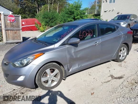 2013 Hyundai Elantra GLS z VIN KMHDH4AE0DU675062, wystawiony jako IAAI lot #43186022 z przebiegiem 146 855 mil mil oraz . Historia ofert i sprzedaży dostępna na DreamBid. Obrazek 2.
