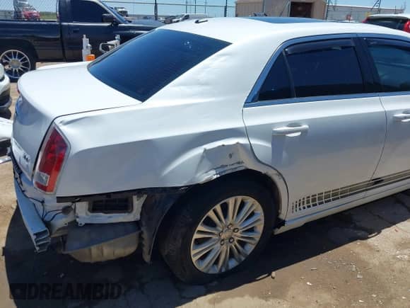 2013 Chrysler 300 with VIN 2C3CCARG1DH533443, listed as a IAAI auction lot 42302718 with 89,098 mi miles and . Bid and sale history available at DreamBid. Image 18.