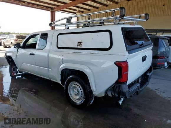 2024 Toyota Tacoma SR with VIN 3TYJDAHN2RT005603, listed as a Copart auction lot 84814075 with 24,405 mi miles and Clean title. Bid and sale history available at DreamBid. Image 2.