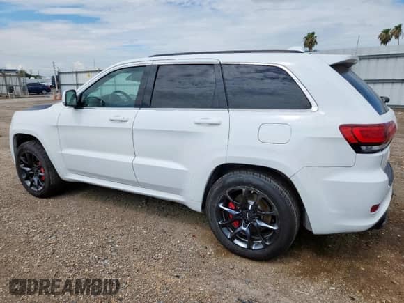 2014 Jeep Grand Cherokee SRT-8 с VIN 1C4RJFDJ8EC588181, выставлен на аукционе Copart как лот 60632635 с пробегом 93 868 миль миль и Списание • Salvage title. История ставок и продаж доступна на DreamBid. Изображение 2.