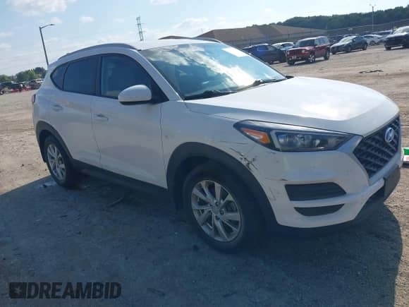 2019 Hyundai Tucson Value z VIN KM8J3CA42KU983740, wystawiony jako IAAI lot #42978756 z przebiegiem 75 438 mil mil oraz . Historia ofert i sprzedaży dostępna na DreamBid. Obrazek 1.